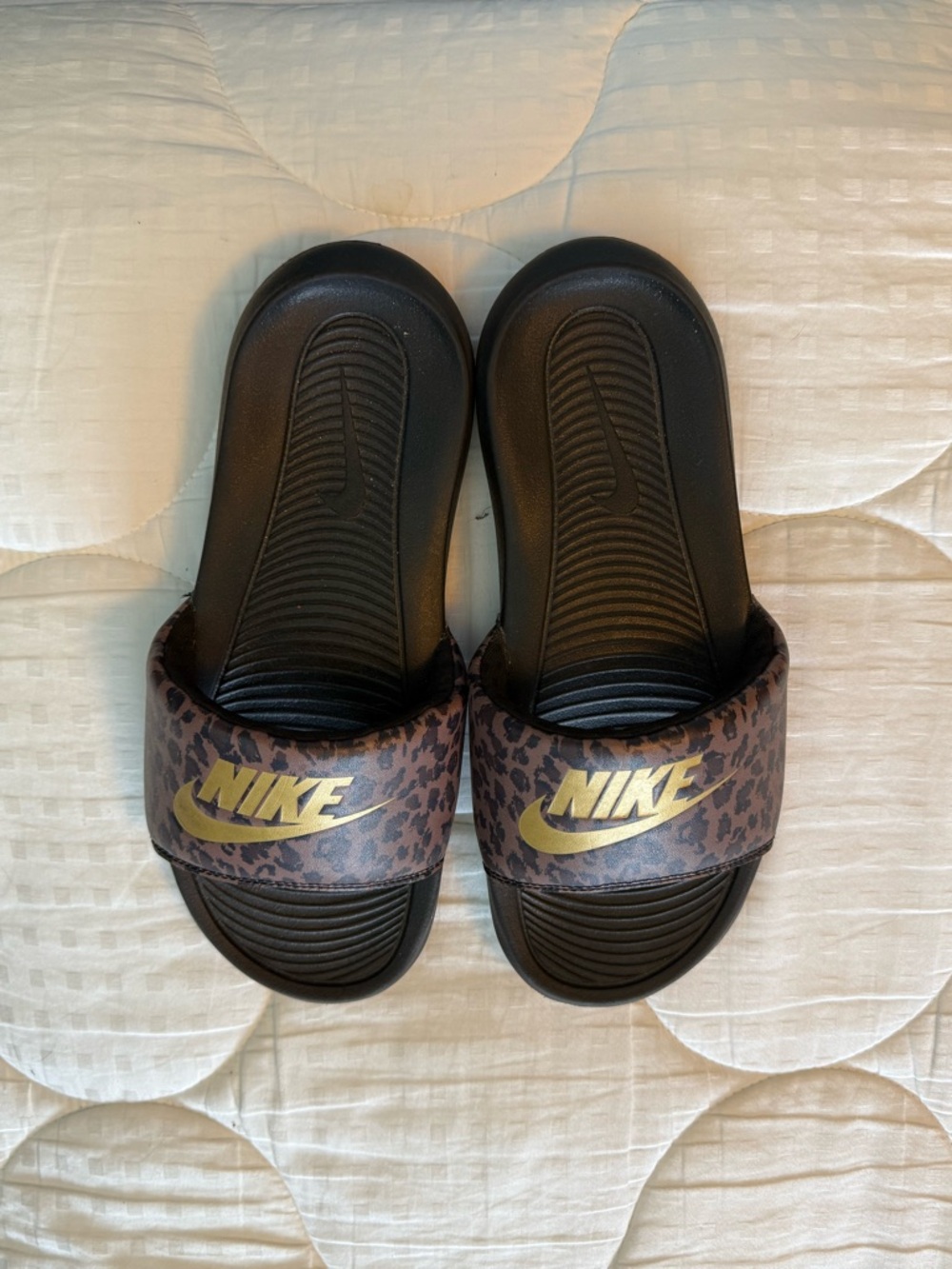 Nike Black Slides with Leopard Strap and Gold Logo